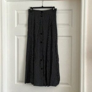 Gorgeous black long skirt with little white stars.